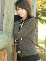 ariel rebel poses in the park