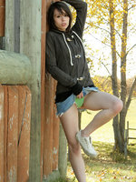ariel rebel poses in the park