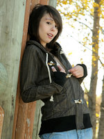 ariel rebel poses in the park