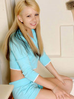 fresh face tempting model posing cute on top of the toilet-bowl