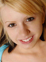fresh face tempting model posing cute on top of the toilet-bowl